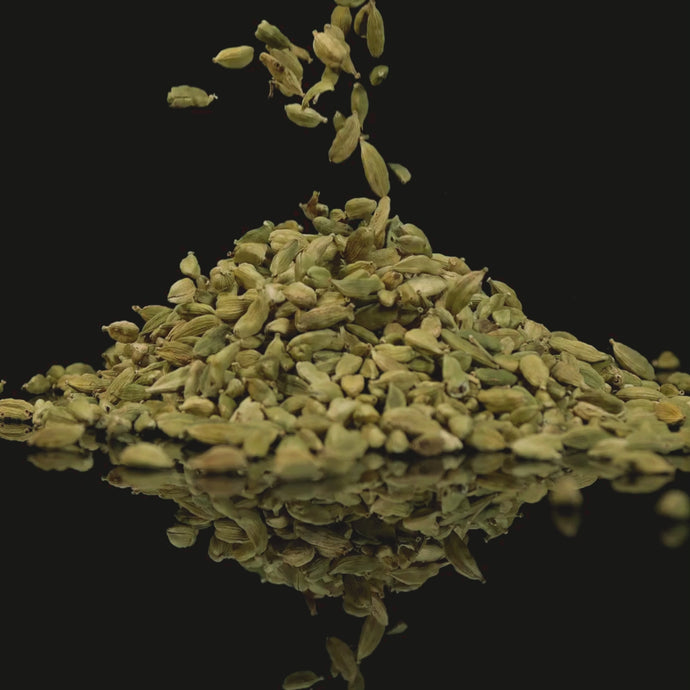 Cardamom being sprinkled